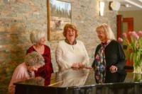 Four Ladies by Piano
